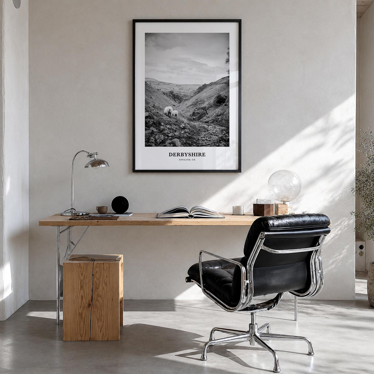 Derbyshire black & white classic poster of United Kingdom – vertical wall art in black wood frame, hanging on wall