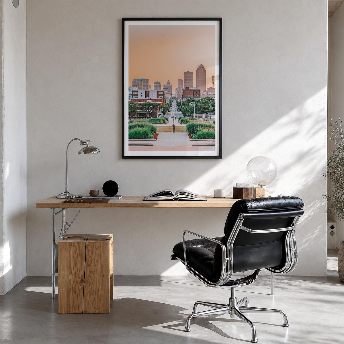 Des Moines colorful photo poster of Iowa, USA – vertical wall art in black wood frame with white border, hanging on wall