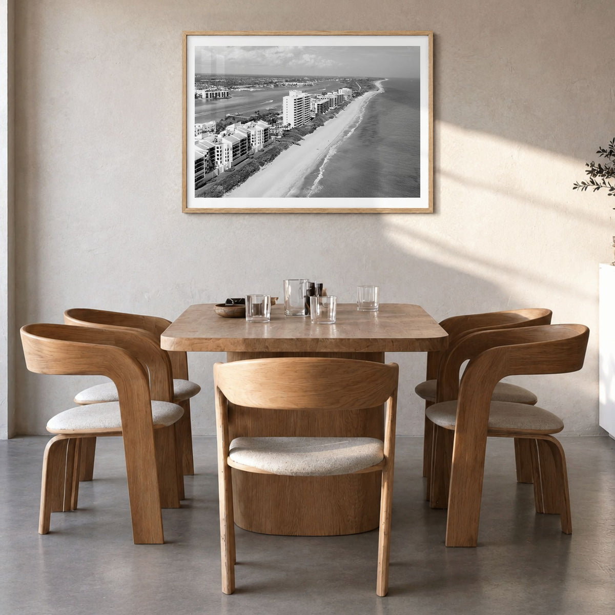 Destin Photo Poster in a natural wood frame, hanging in a dining room, white border