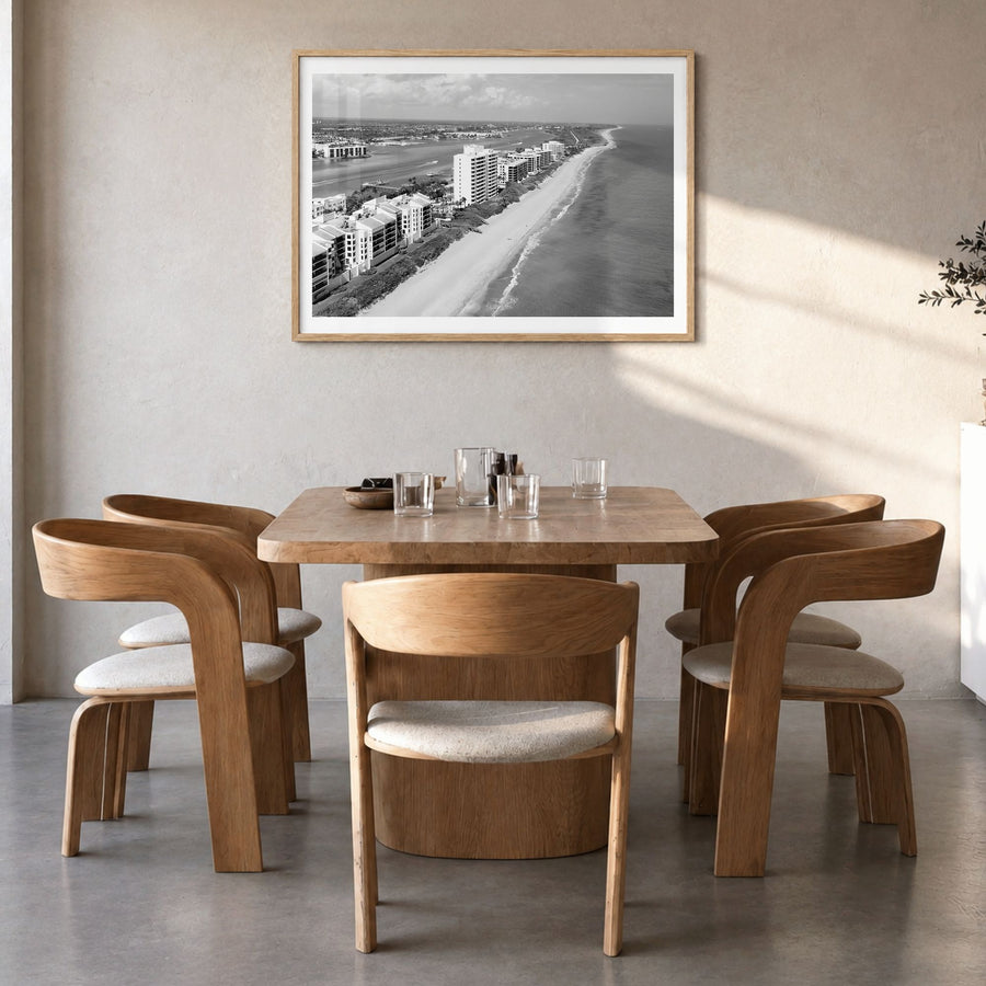 Destin Photo Poster in a natural wood frame, hanging in a dining room, white border