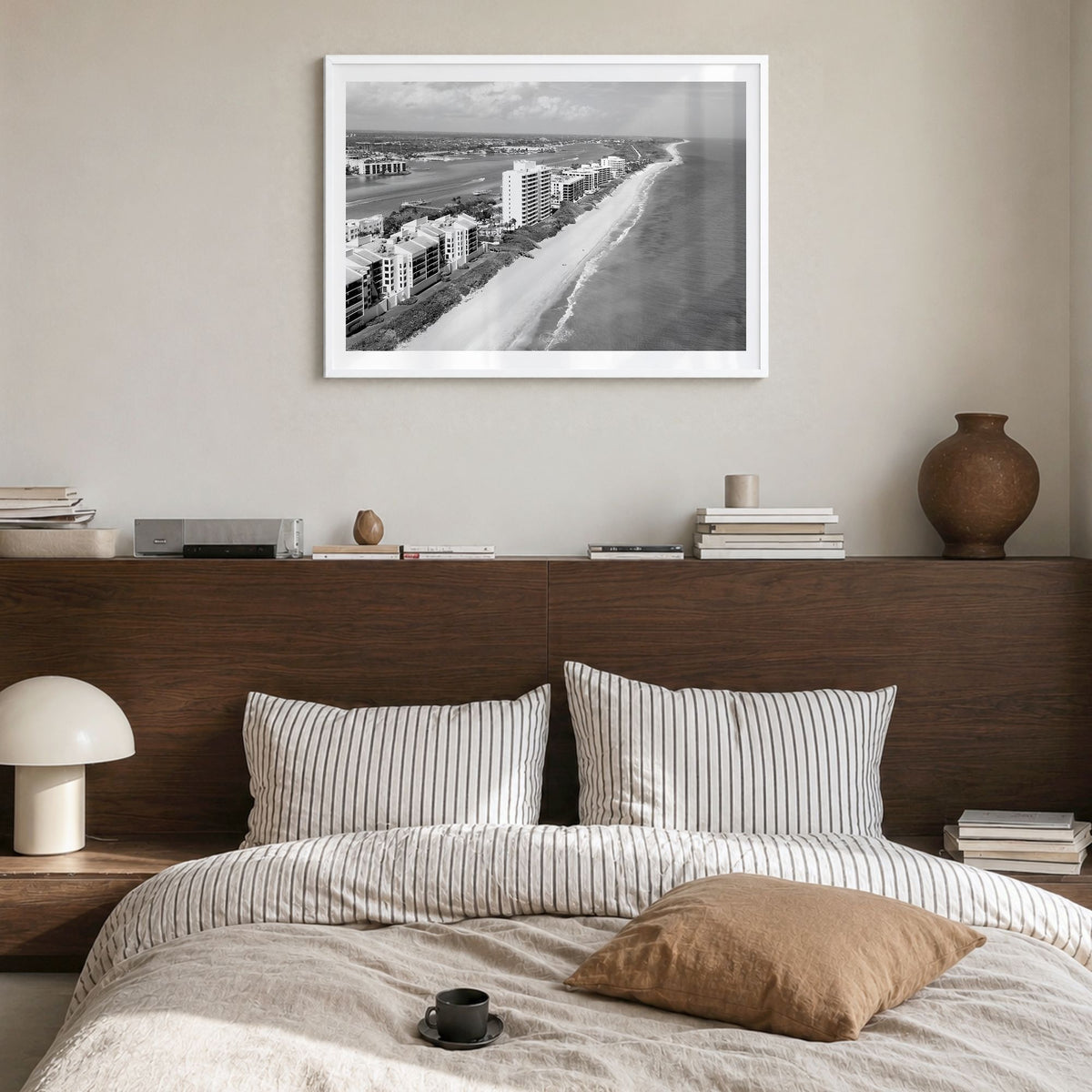 Destin Photo Poster in a white wood frame, hanging in a bedroom, white border