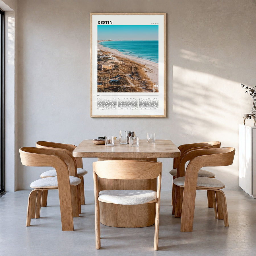 Destin Travel Poster in a natural wood frame, hanging in a dining room