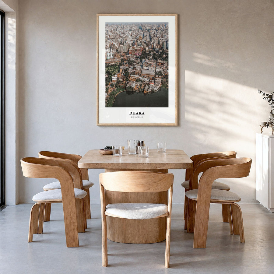 Dhaka Classic Poster in a natural wood frame, hanging in a dining room