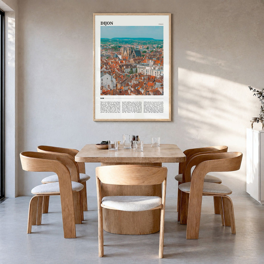 Dijon Travel Poster in a natural wood frame, hanging in a dining room