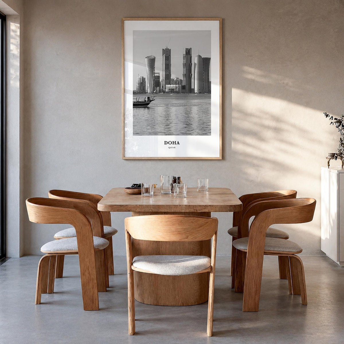 Doha black & white classic poster of Qatar – vertical wall art in natural wood frame, hanging on wall