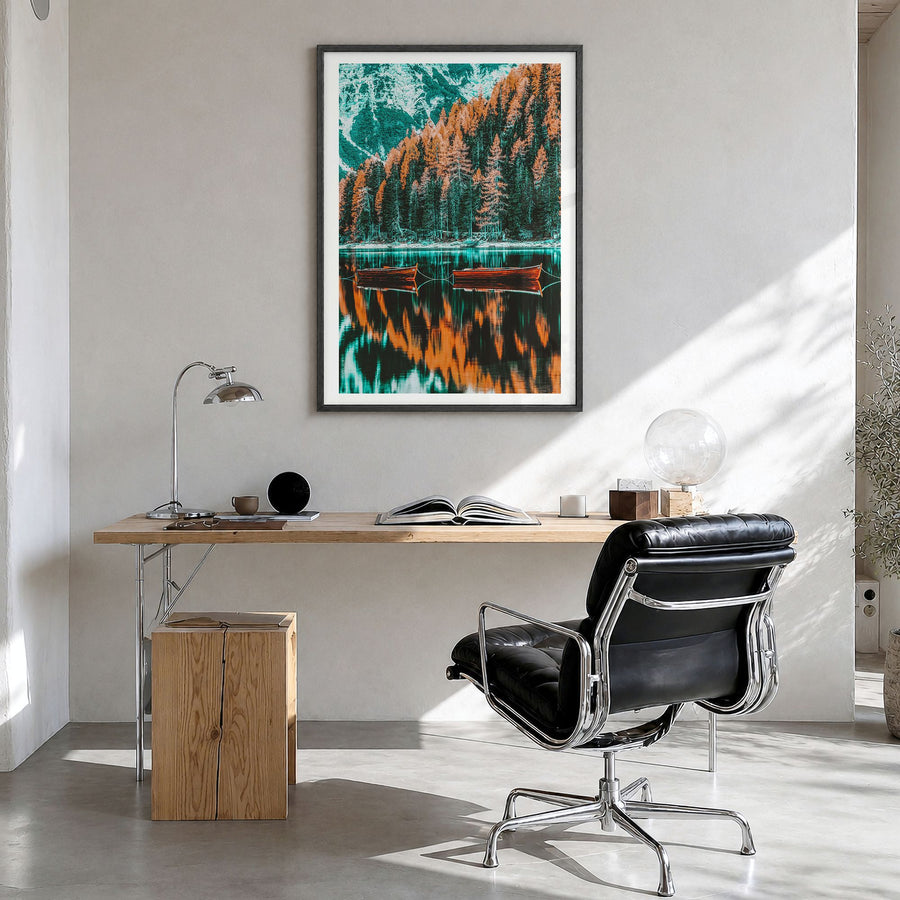 Dolomites Photo Poster in a black wood frame, hanging in a bright home office, white border