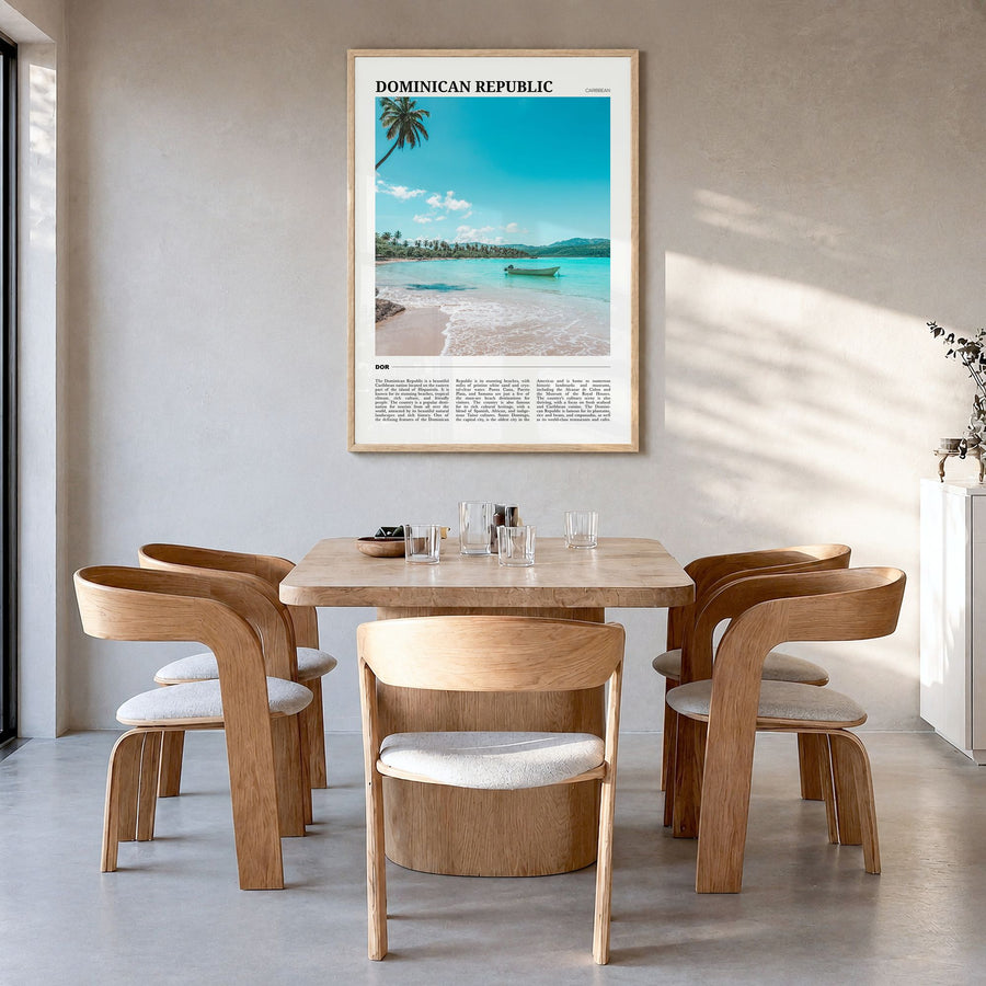 Dominican Republic Travel Poster in a natural wood frame, hanging in a dining room