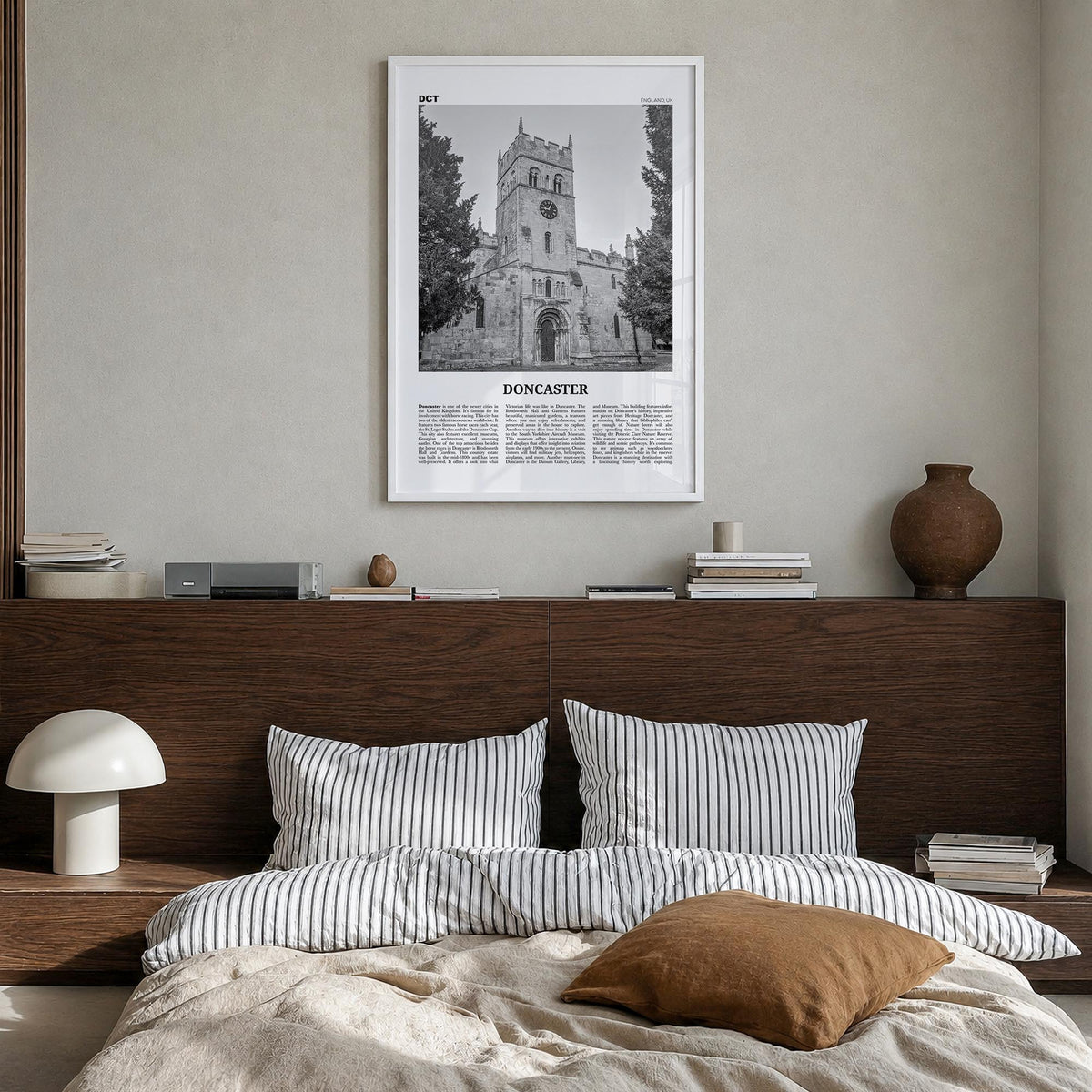 Doncaster black & white newspaper poster of United Kingdom – vertical wall art in white wood frame, hanging on wall