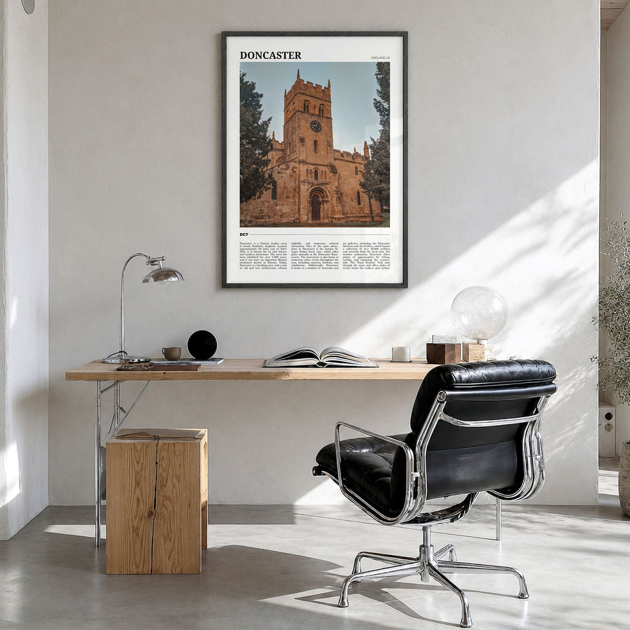 Doncaster Travel Poster in a black wood frame, hanging in a bright home office
