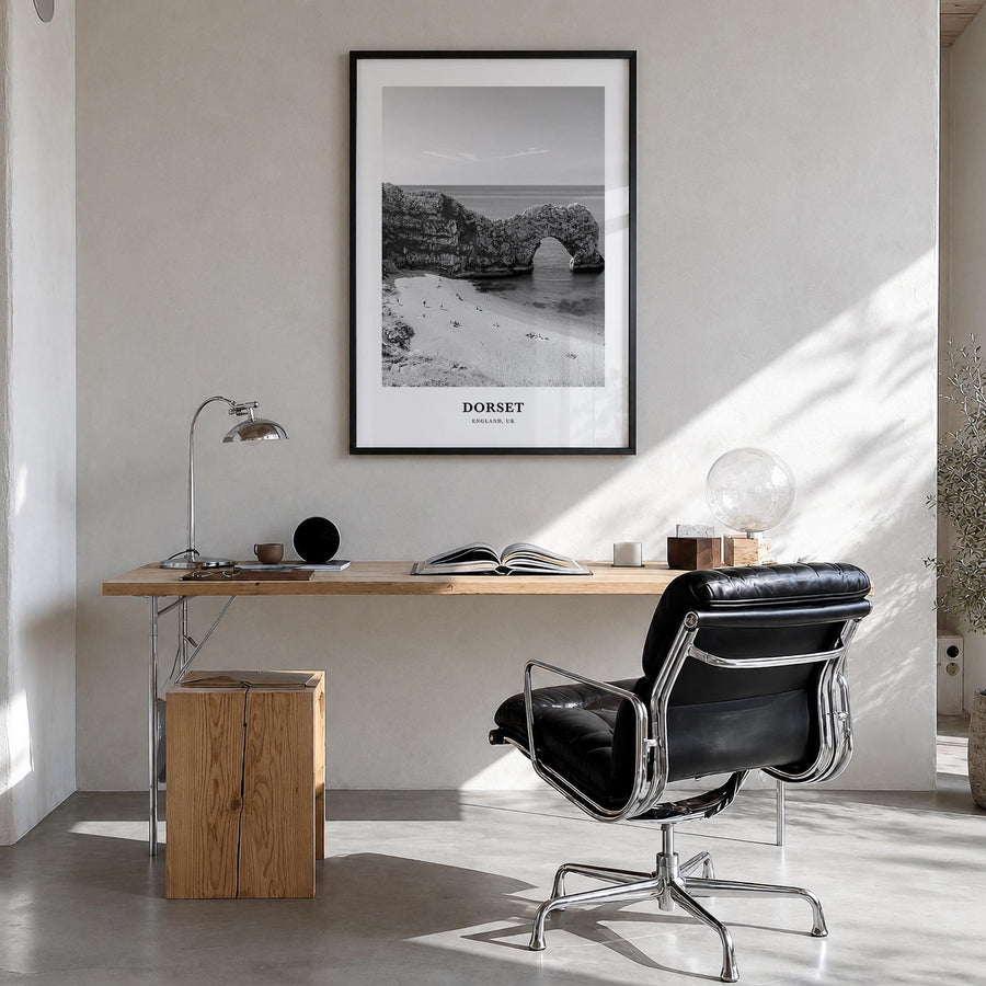 Dorset black & white classic poster of England, UK – vertical wall art in black wood frame, hanging on wall