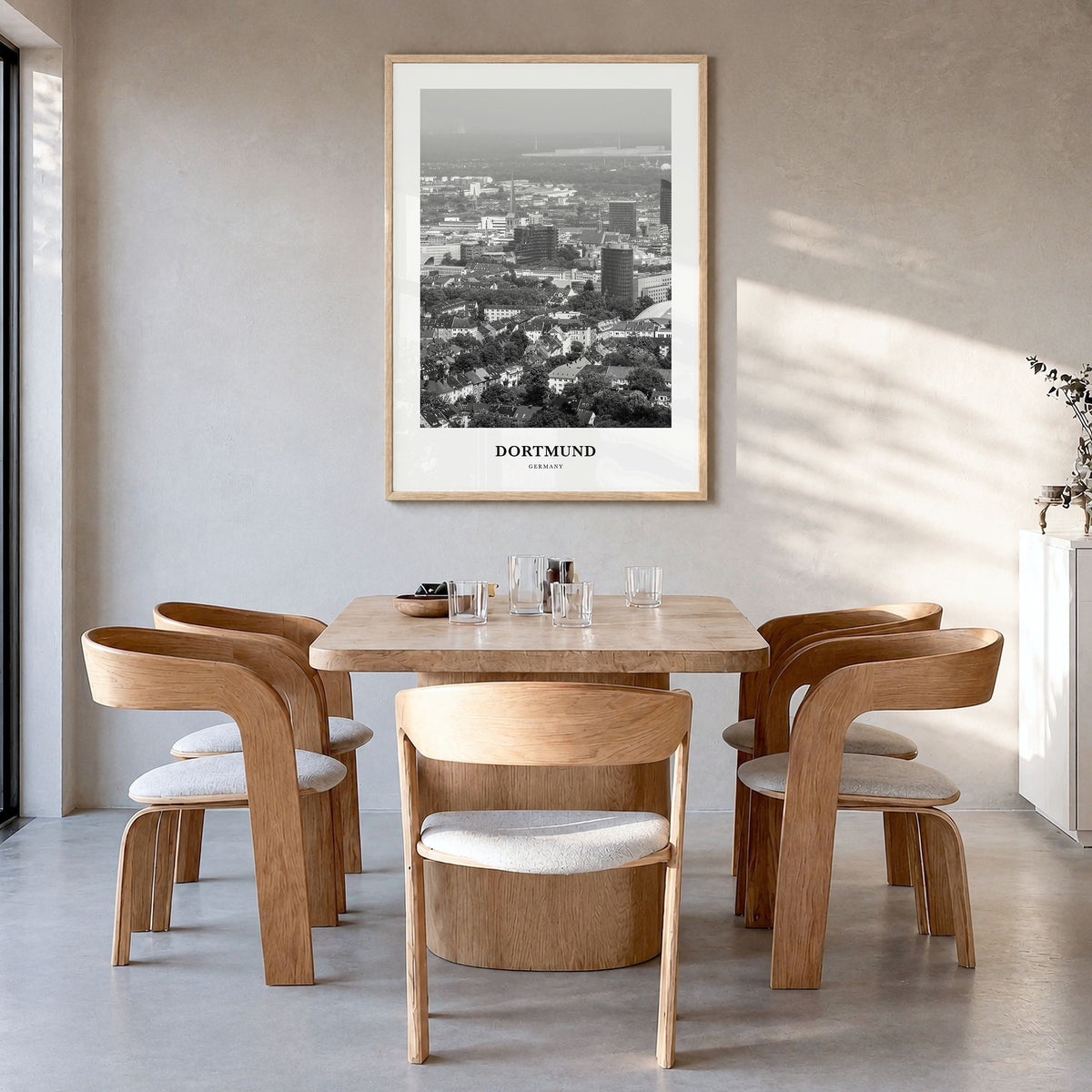 Dortmund Classic Poster in a natural wood frame, hanging in a dining room