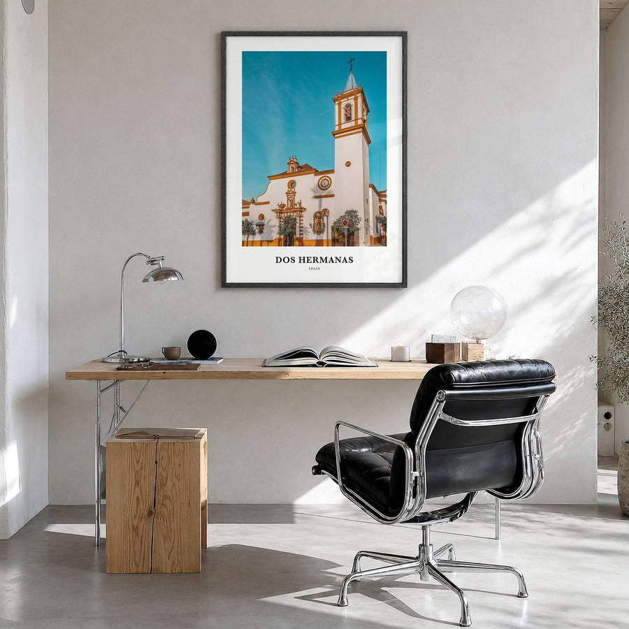 Dos Hermanas Classic Poster in a black wood frame, hanging in a bright home office