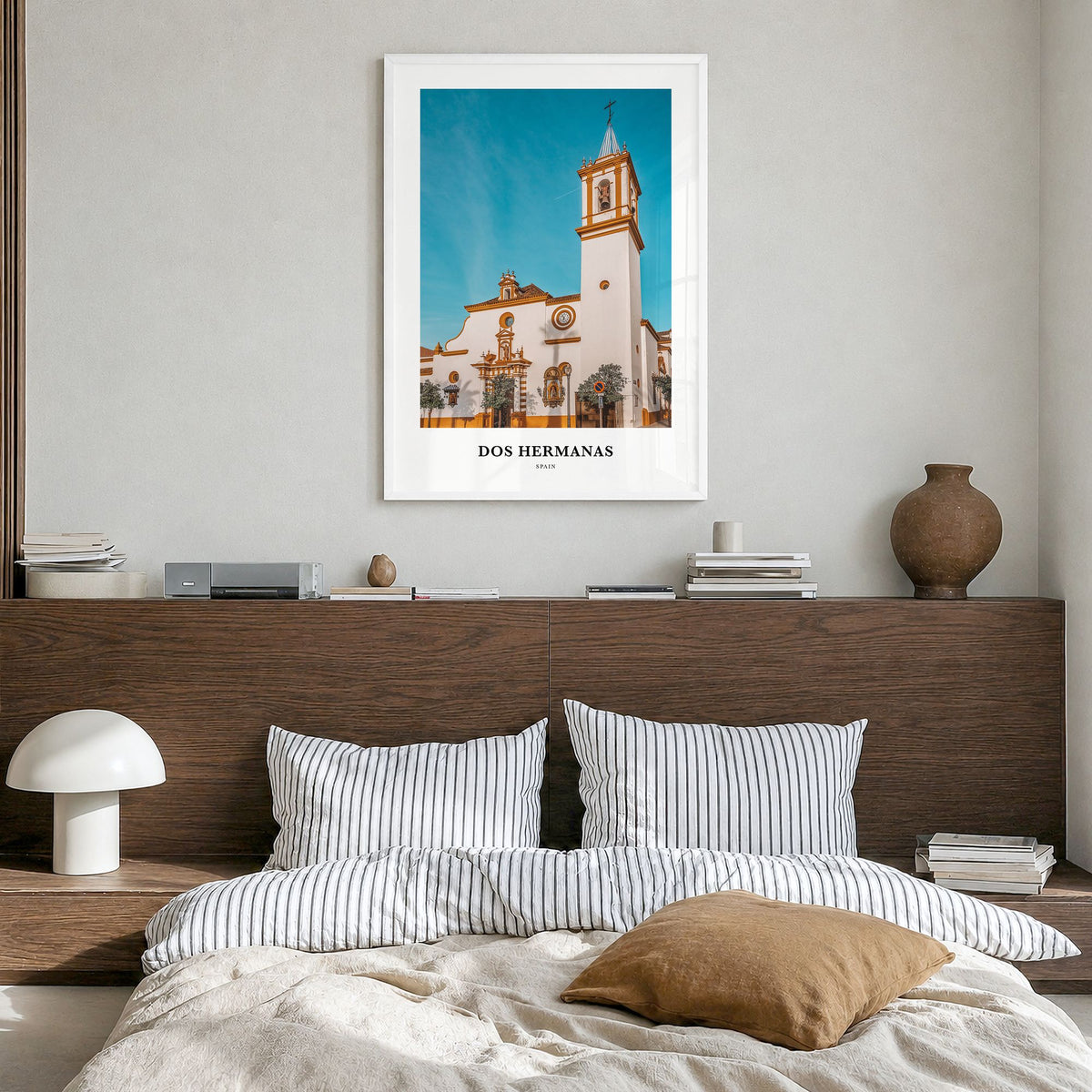 Dos Hermanas Classic Poster in a white wood frame, hanging in a bedroom