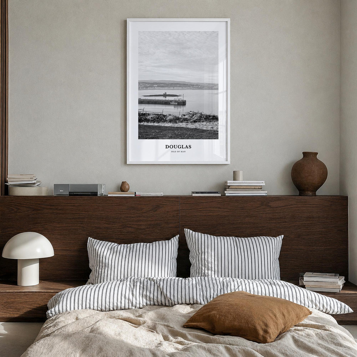 Douglas black & white classic poster of Ireland – vertical wall art in white wood frame, hanging on wall