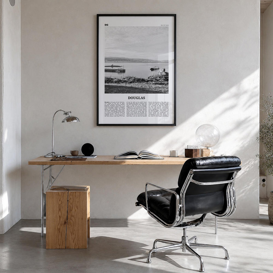 Douglas black & white newspaper poster of Ireland – vertical wall art in black wood frame, hanging on wall