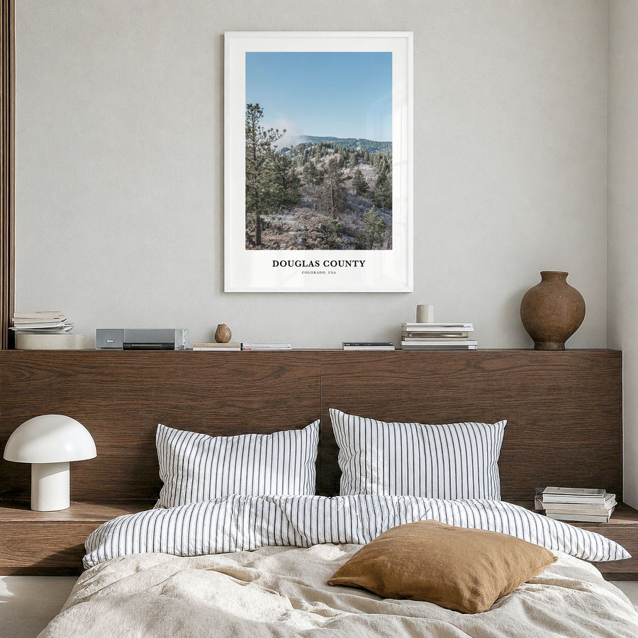 Douglas County, Colorado Classic Poster in a white wood frame, hanging in a bedroom