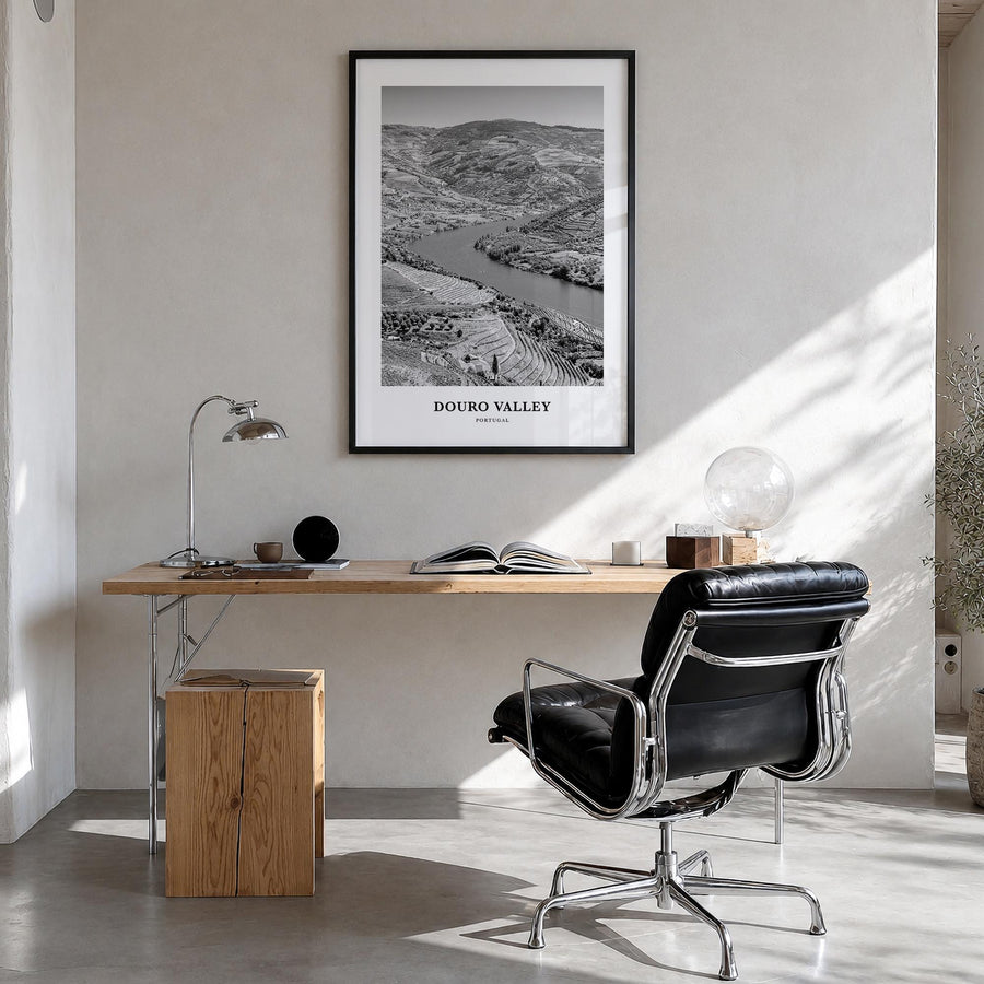 Douro Valley black & white classic poster of Portugal – vertical wall art in black wood frame, hanging on wall