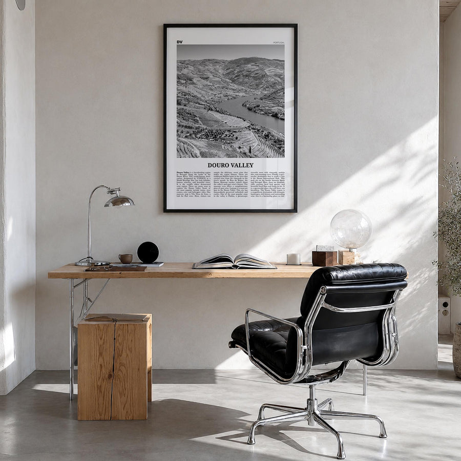 Douro Valley black & white newspaper poster of Portugal – vertical wall art in black wood frame, hanging on wall