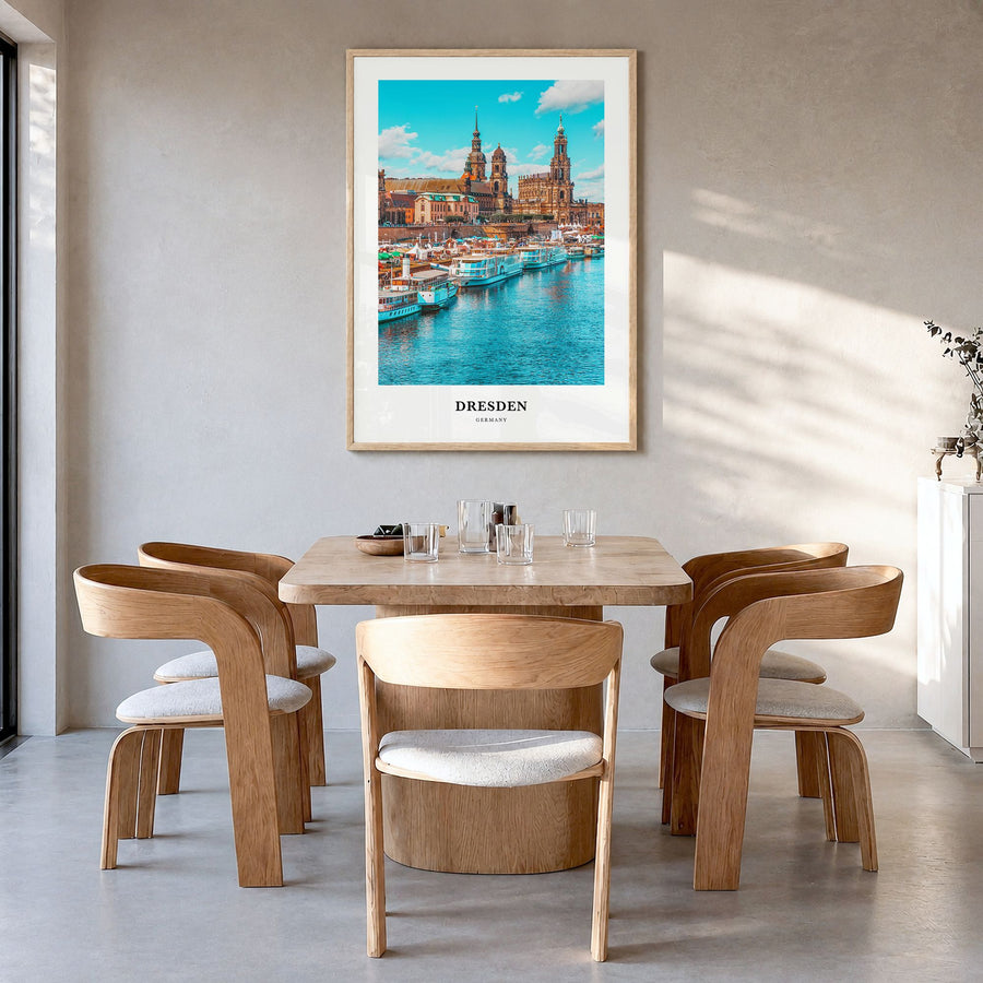 Dresden Classic Poster in a natural wood frame, hanging in a dining room