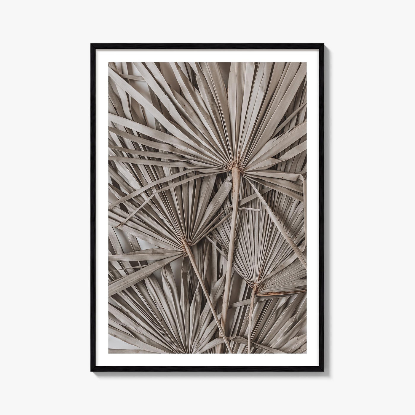 Dry Tropical Palm Leaf no. 1 colorful photo poster – vertical wall art, unframed print shown in interior mockup