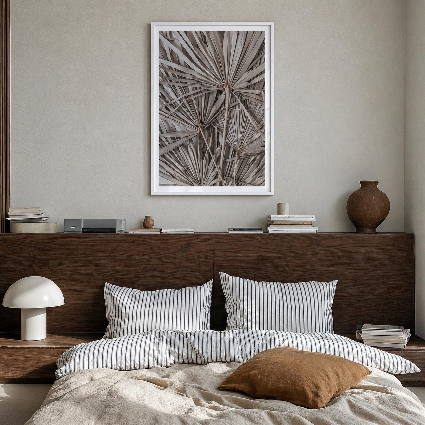 Dry Tropical Palm Leaf no. 1 colorful photo poster – vertical wall art in white wood frame with white border, hanging on wall