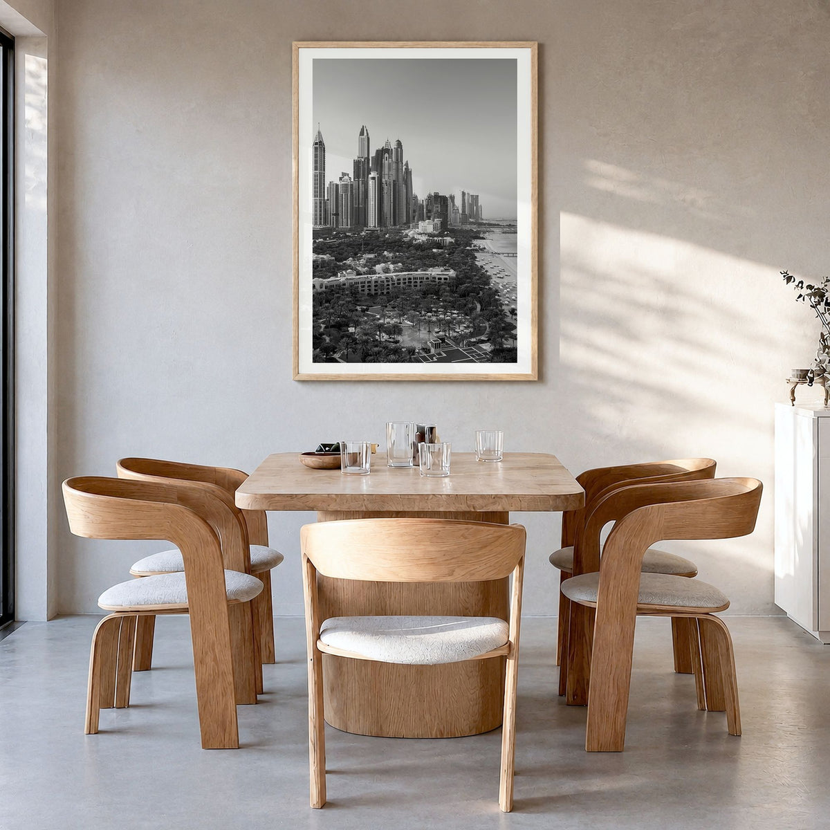 Dubai Photo No 1 Poster in a natural wood frame, hanging in a dining room, white border