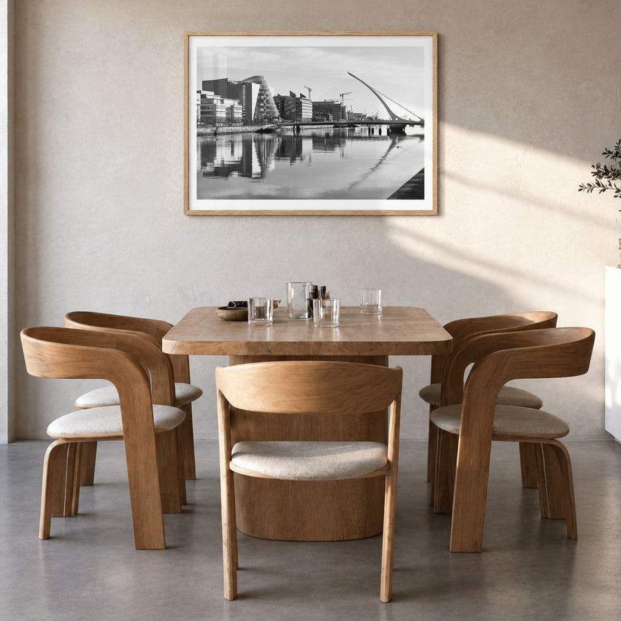 Dublin Photo Poster in a natural wood frame, hanging in a dining room, white border