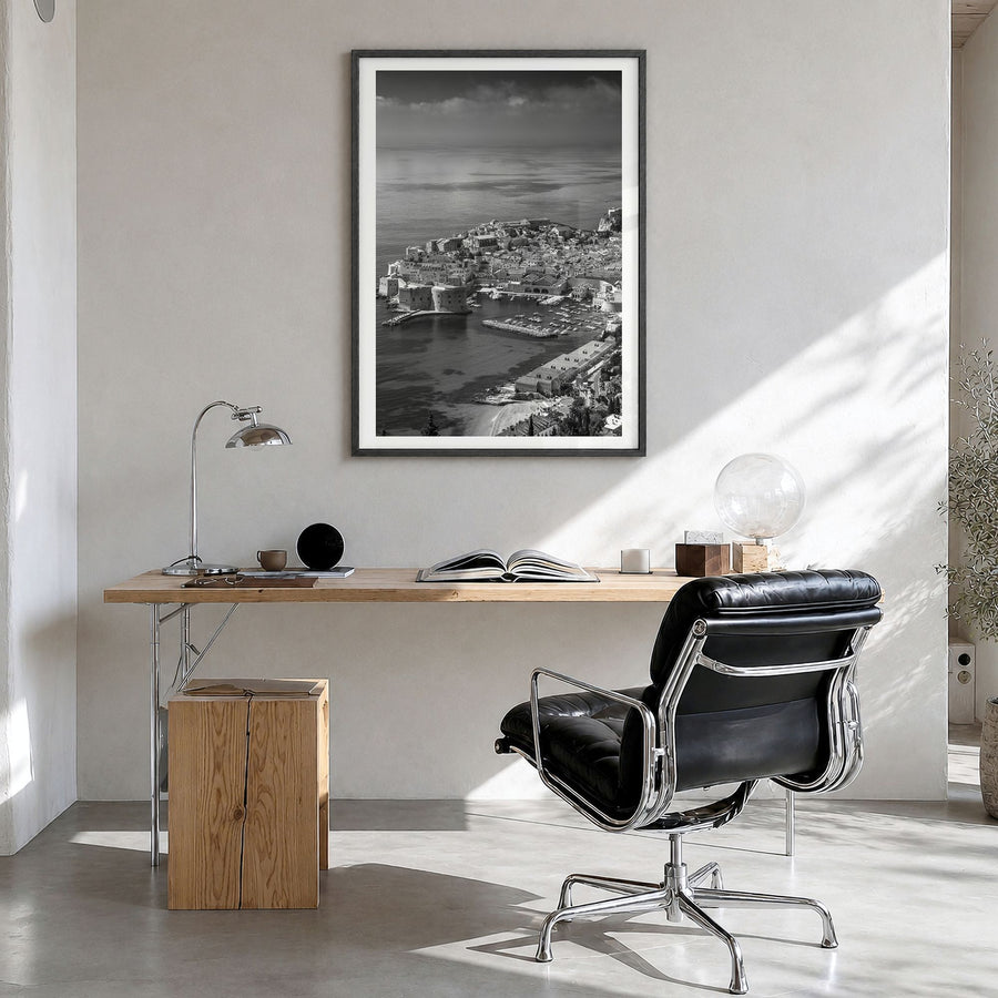Dubrovnik Photo Poster in a black wood frame, hanging in a bright home office, white border