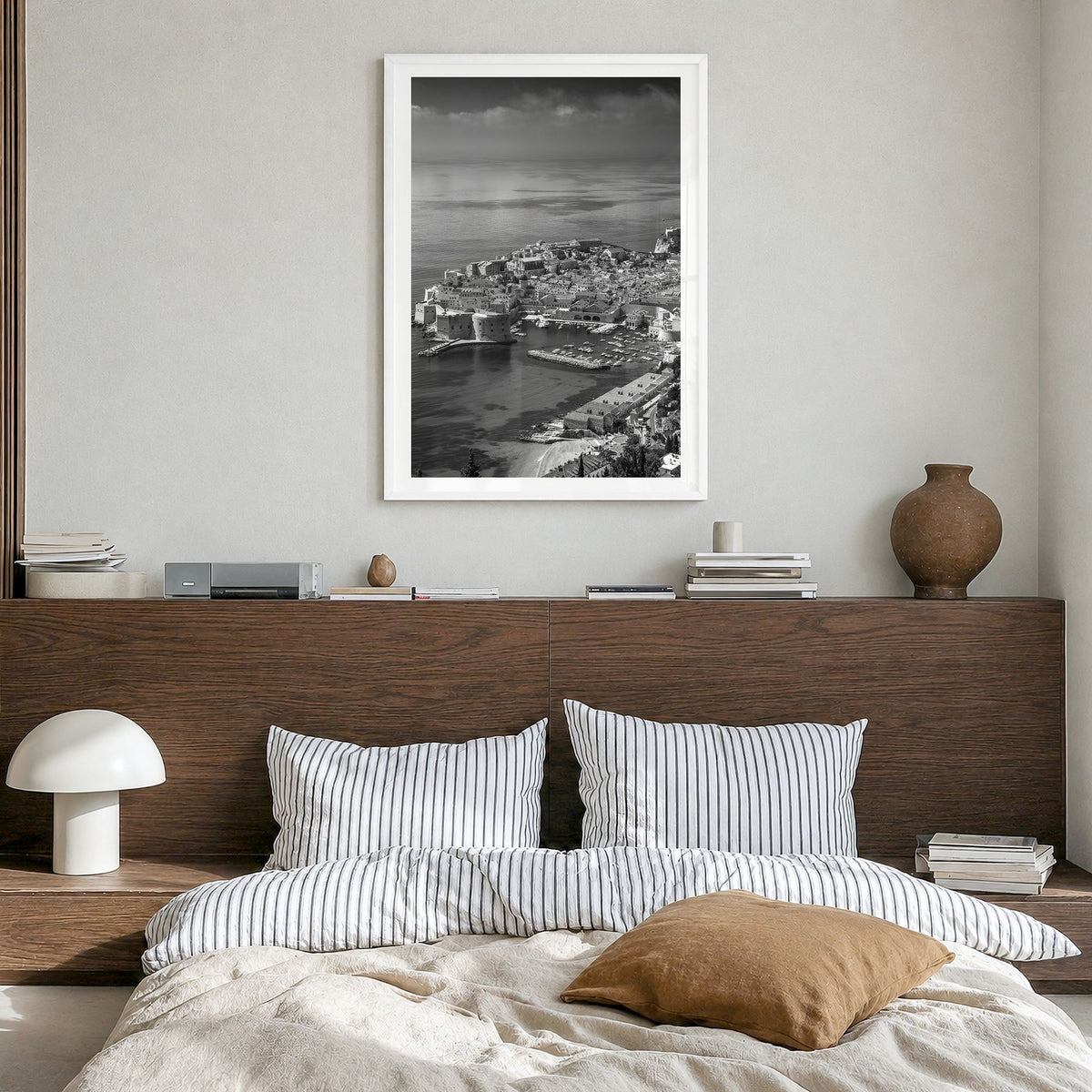 Dubrovnik Photo Poster in a white wood frame, hanging in a bedroom, white border