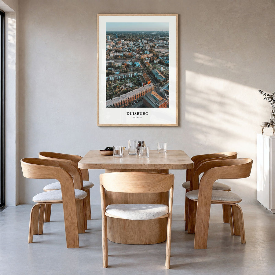 Duisburg Classic Poster in a natural wood frame, hanging in a dining room
