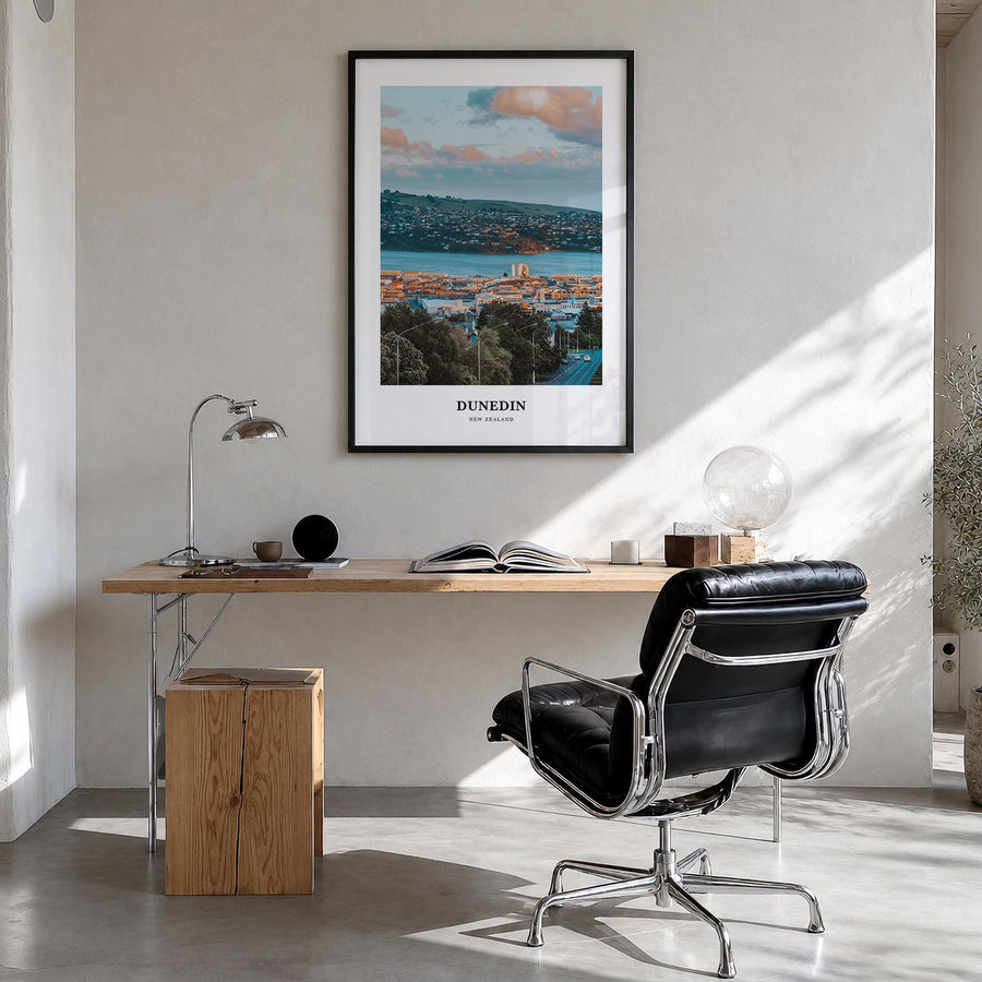 Dunedin no. 1 colorful classic poster of New Zealand – vertical wall art in black wood frame, hanging on wall