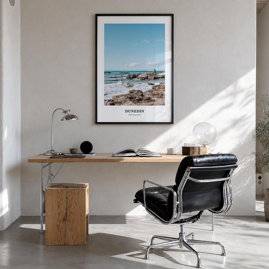 Dunedin no. 2 colorful classic poster of New Zealand – vertical wall art in black wood frame, hanging on wall