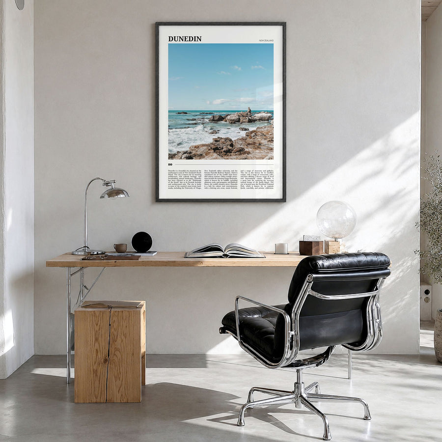 Dunedin Travel No 2 Poster in a black wood frame, hanging in a bright home office