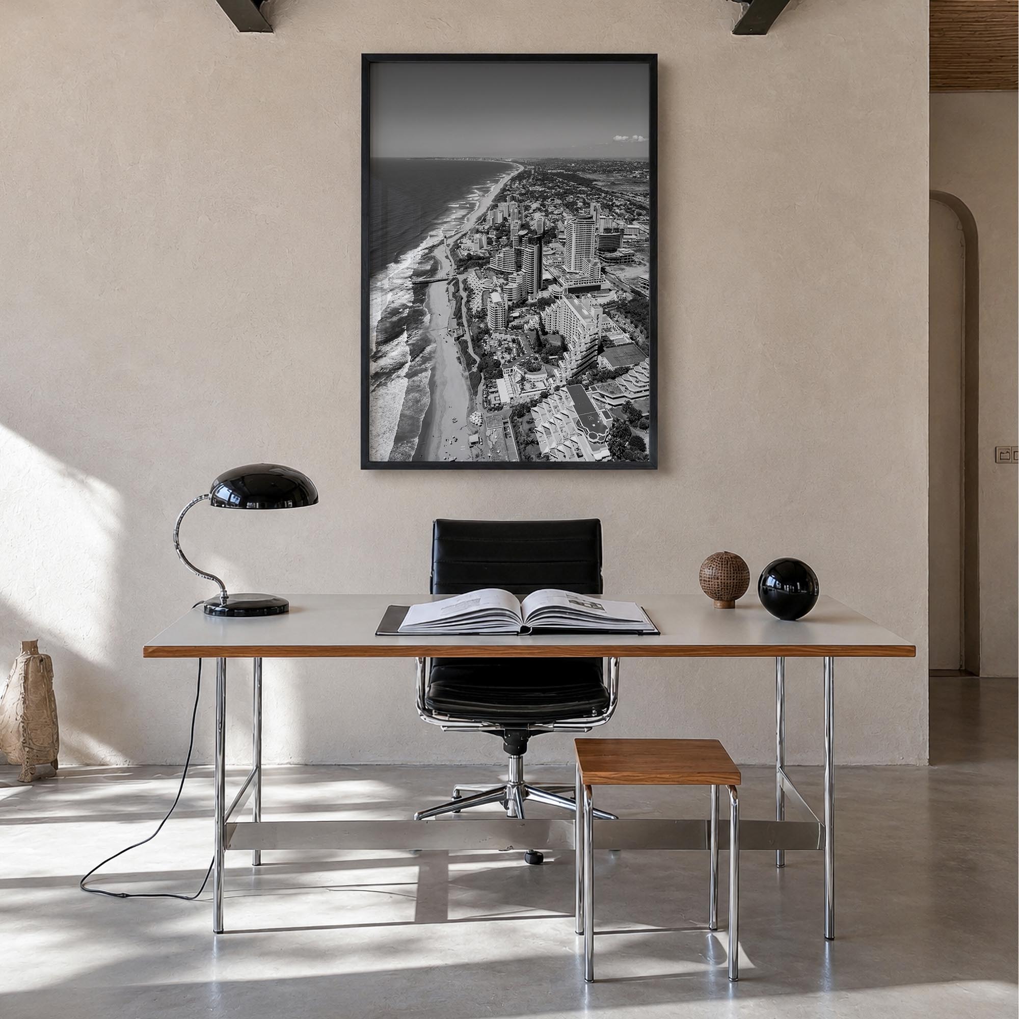 Durban black & white photo poster of South Africa – vertical wall art in black wood frame, hanging on wall