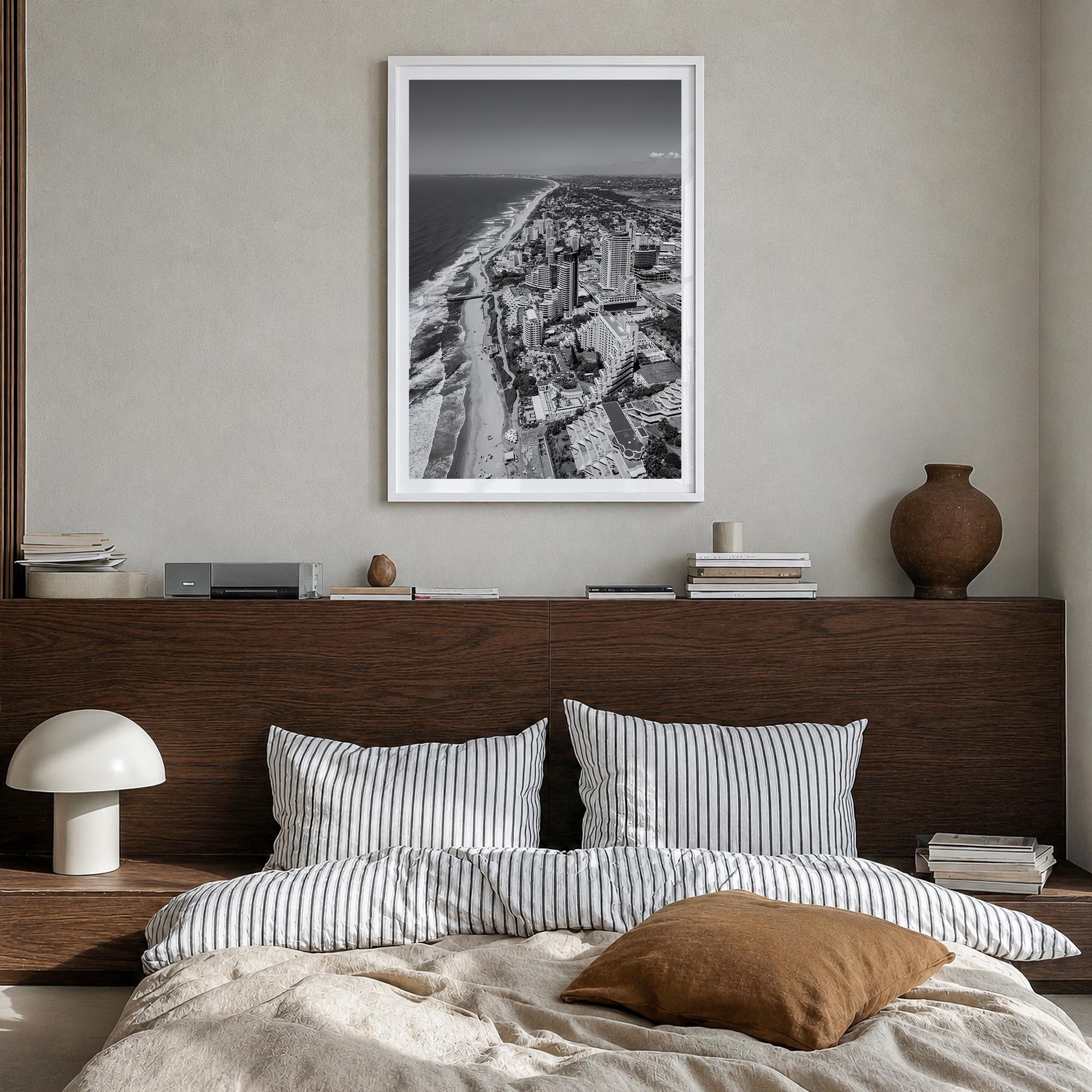 Durban black & white photo poster of South Africa – vertical wall art in white wood frame with white border, hanging on wall