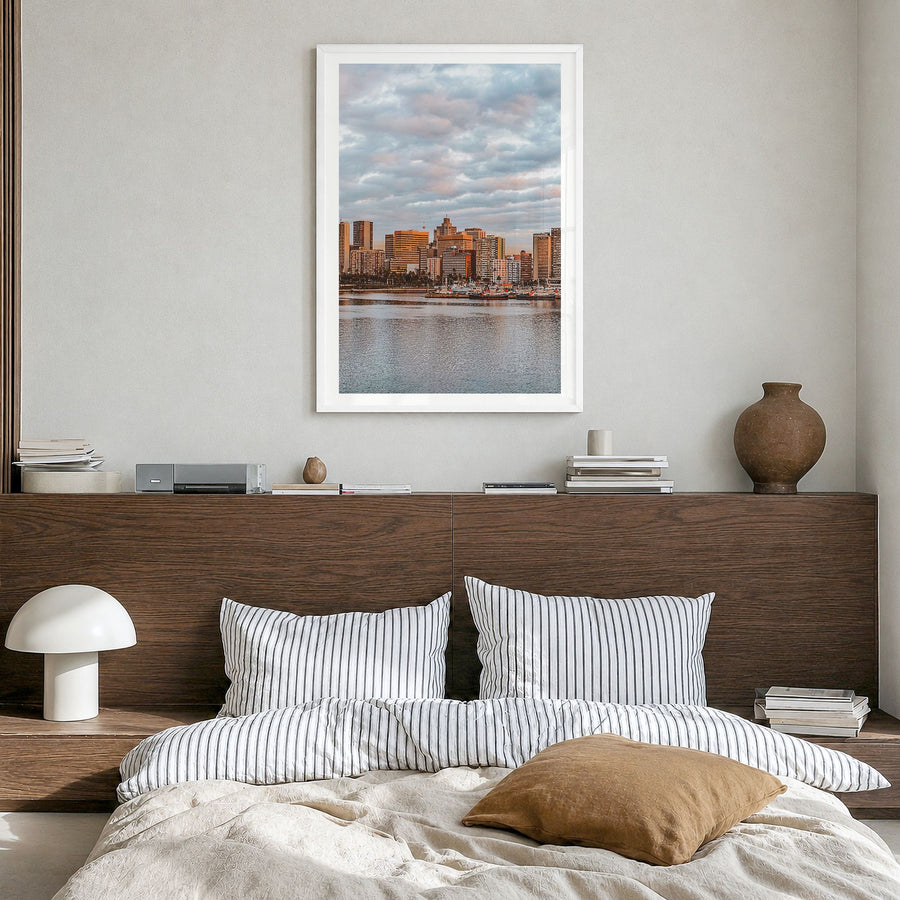 Durban Photo Poster in a white wood frame, hanging in a bedroom, white border