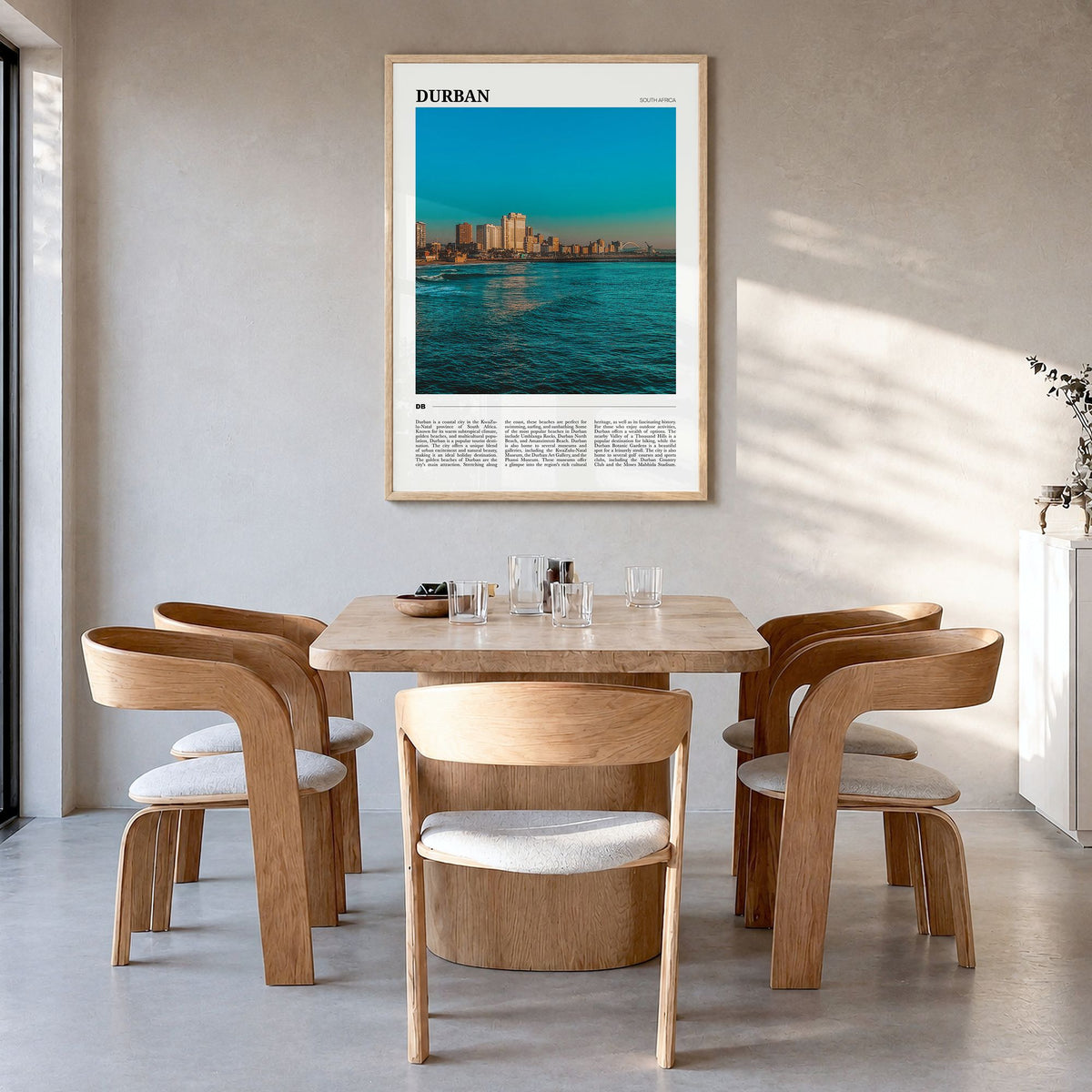 Durban Travel Poster in a natural wood frame, hanging in a dining room