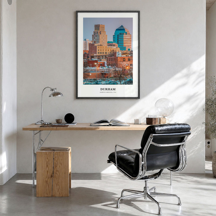 Durham, North Carolina Classic Poster in a black wood frame, hanging in a bright home office