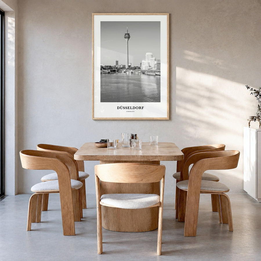 Düsseldorf Classic No 2 Poster in a natural wood frame, hanging in a dining room