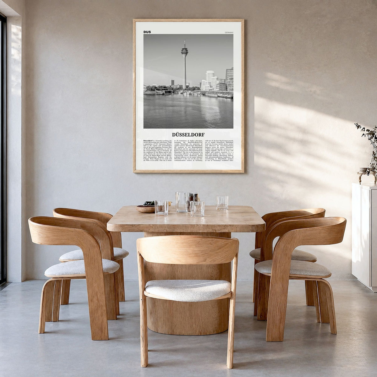 Düsseldorf Newspaper No 1 Poster in a natural wood frame, hanging in a dining room