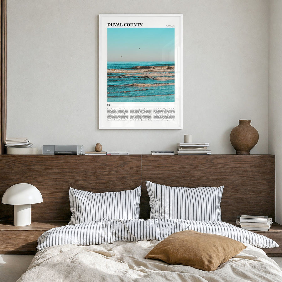 Duval County Travel Poster in a white wood frame, hanging in a bedroom