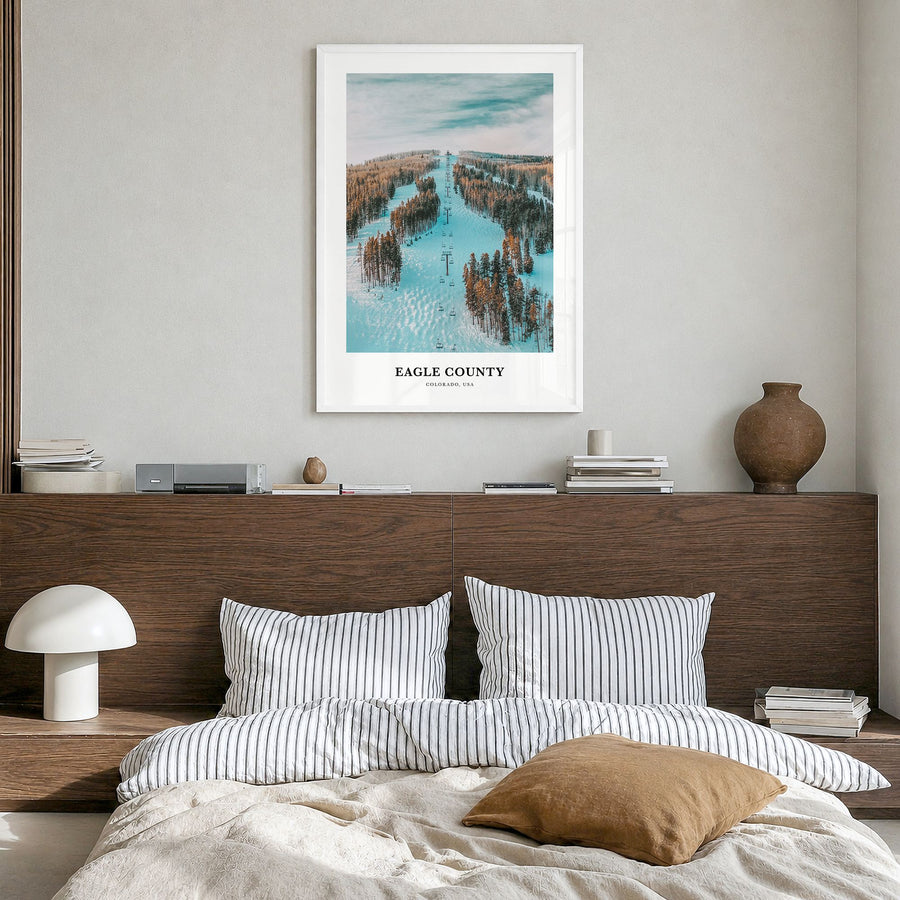 Eagle County Classic Poster in a white wood frame, hanging in a bedroom
