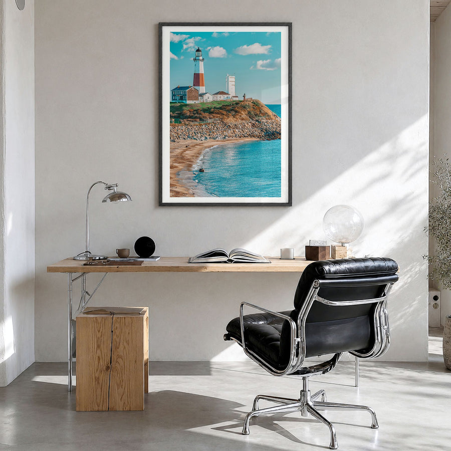 East Hampton Photo Poster in a black wood frame, hanging in a bright home office, white border