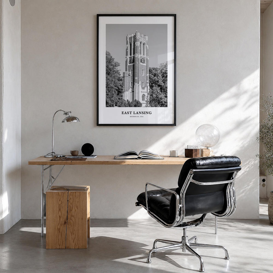 East Lansing black & white classic poster of Michigan, USA – vertical wall art in black wood frame, hanging on wall