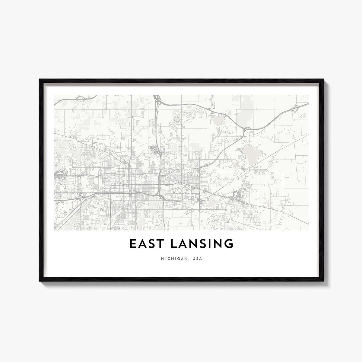 East Lansing black & white map poster of Michigan, USA – horizontal wall art, unframed print shown in interior mockup