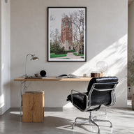East Lansing colorful photo poster of Michigan, USA – vertical wall art in black wood frame with white border, hanging on wal