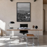 East Los Angeles black & white photo poster of Los Angeles, California – vertical wall art in black wood frame, hanging on wa