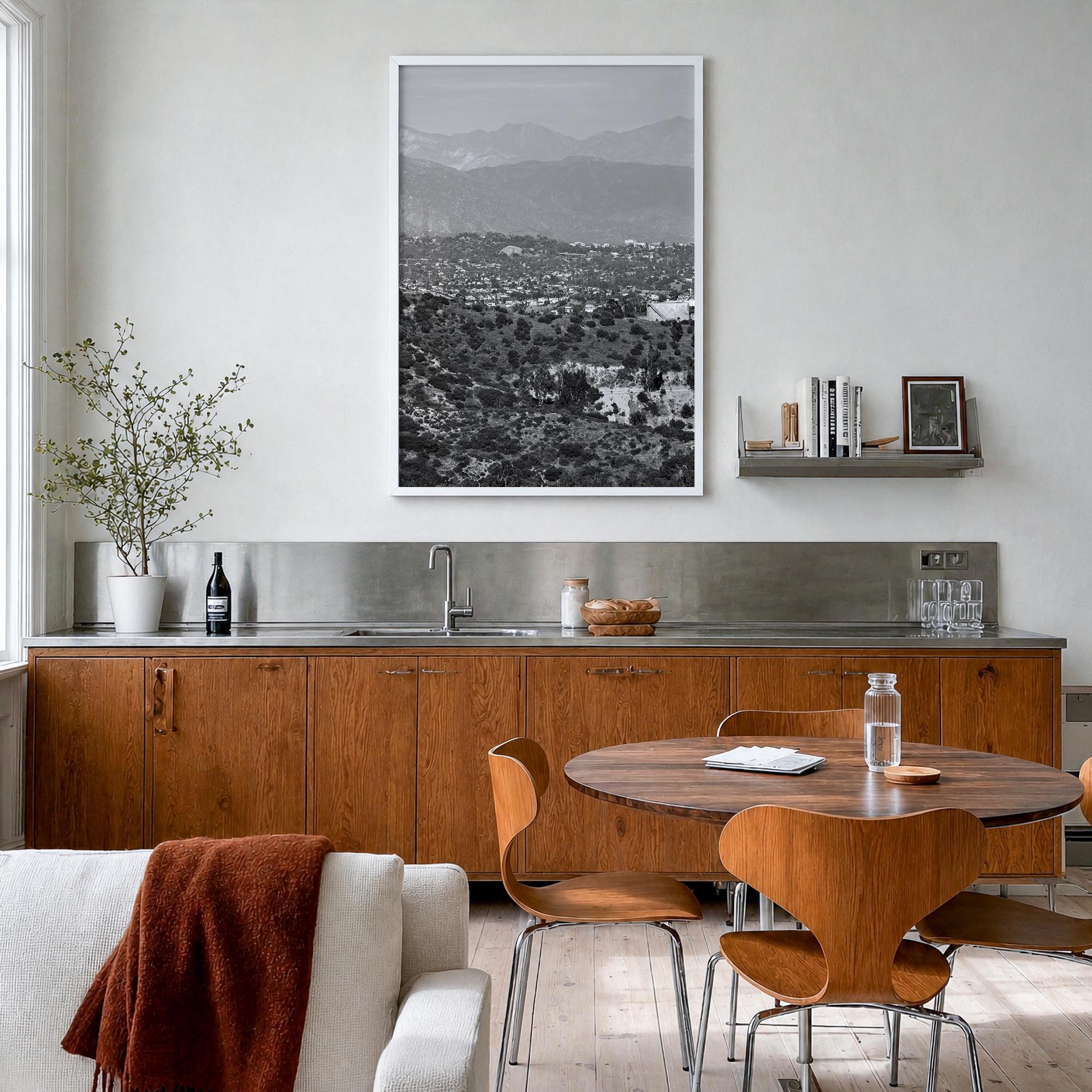 East Los Angeles black & white photo poster of Los Angeles, California – vertical wall art in white wood frame, hanging on wa