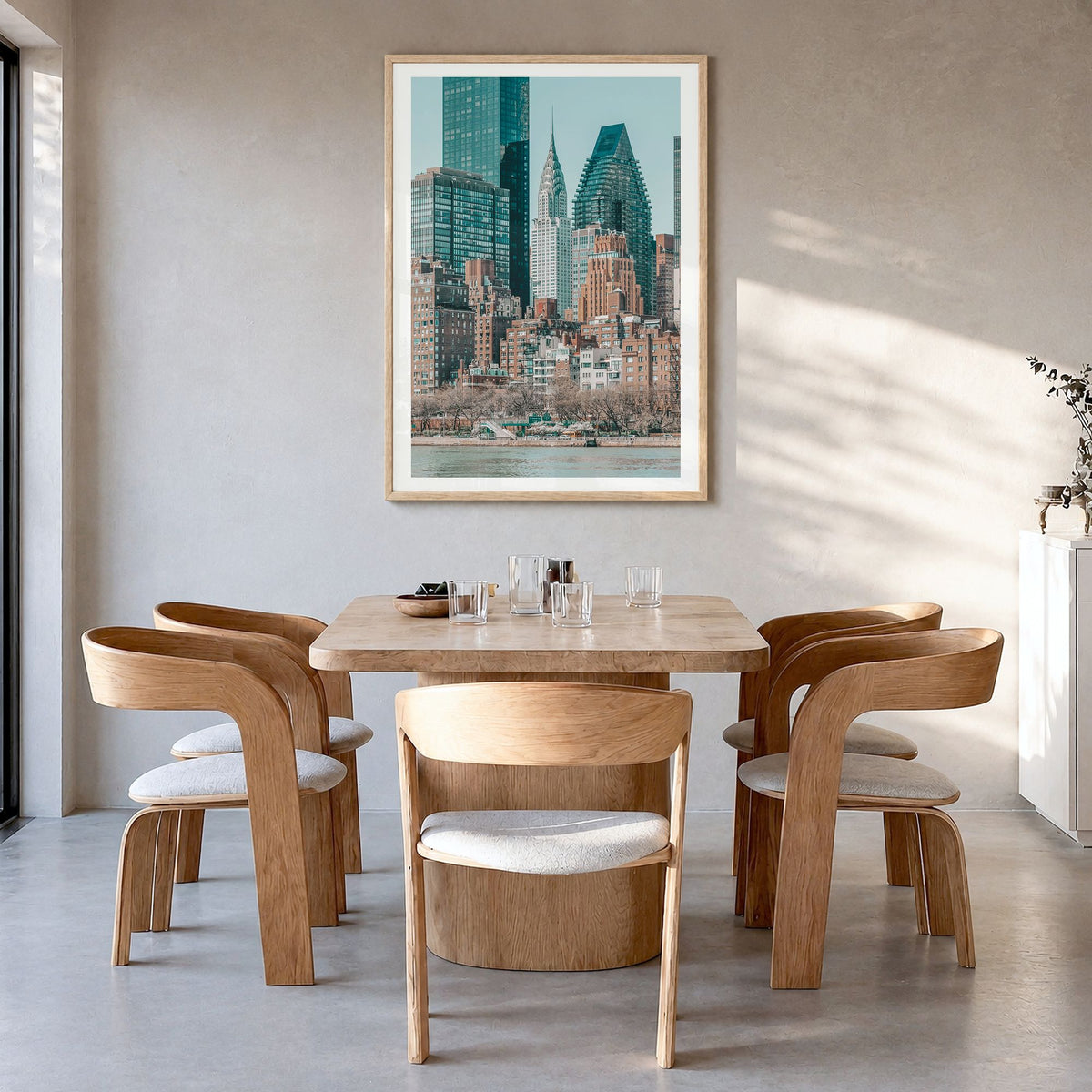 Roosevelt Island, New York City Photo Poster in a natural wood frame, hanging in a dining room, white border
