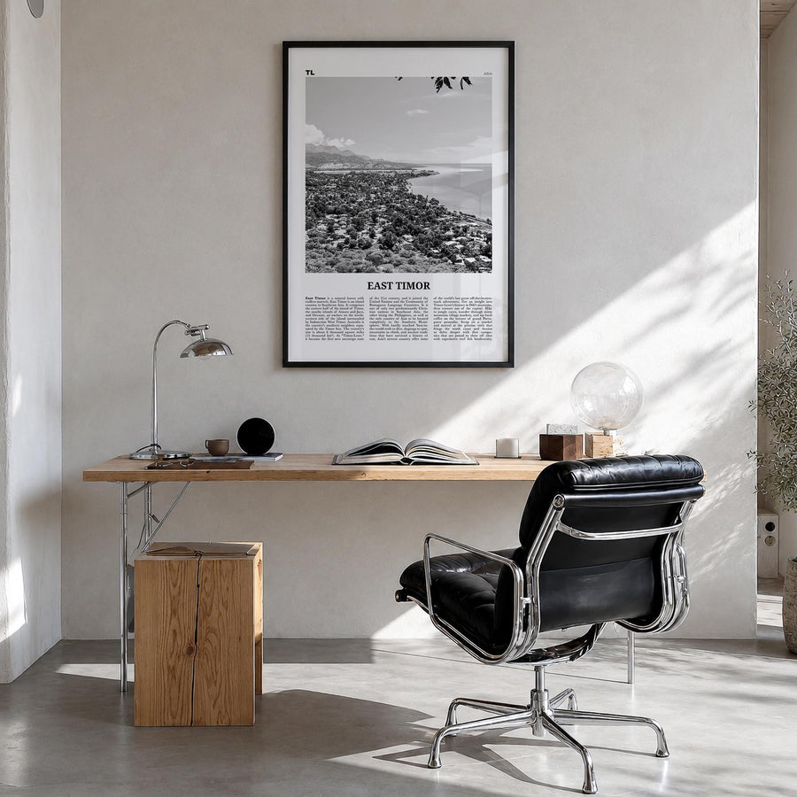 East Timor black & white newspaper poster of Asia – vertical wall art in black wood frame, hanging on wall